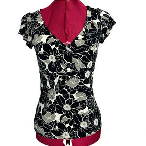 Jacob body hugging black/tan split cap-sleeve top front crossover at the bust